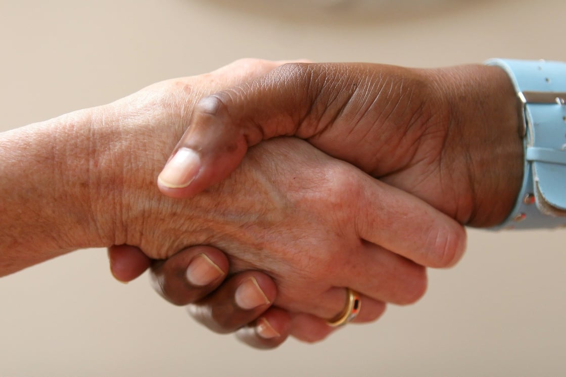 man-woman handshake